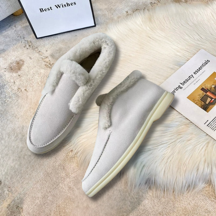 Calzature invernali eleganti da donna con dettagli di stile, ideali per comfort e versatilità.
