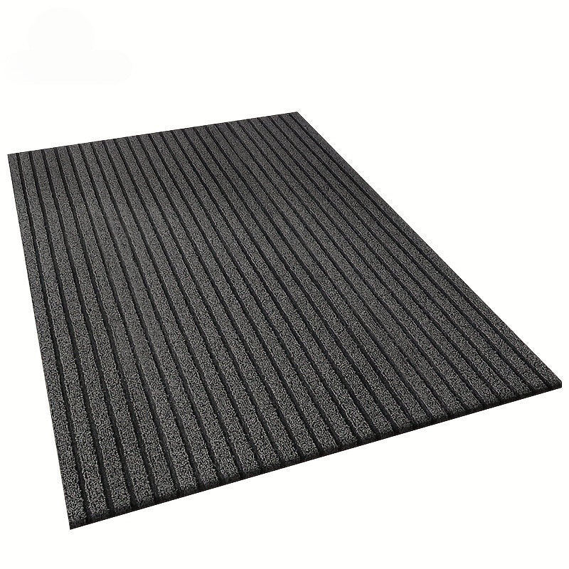 Zerbino antiscivolo in poliestere/PVC a righe, versatile per ingressi interni ed esterni.