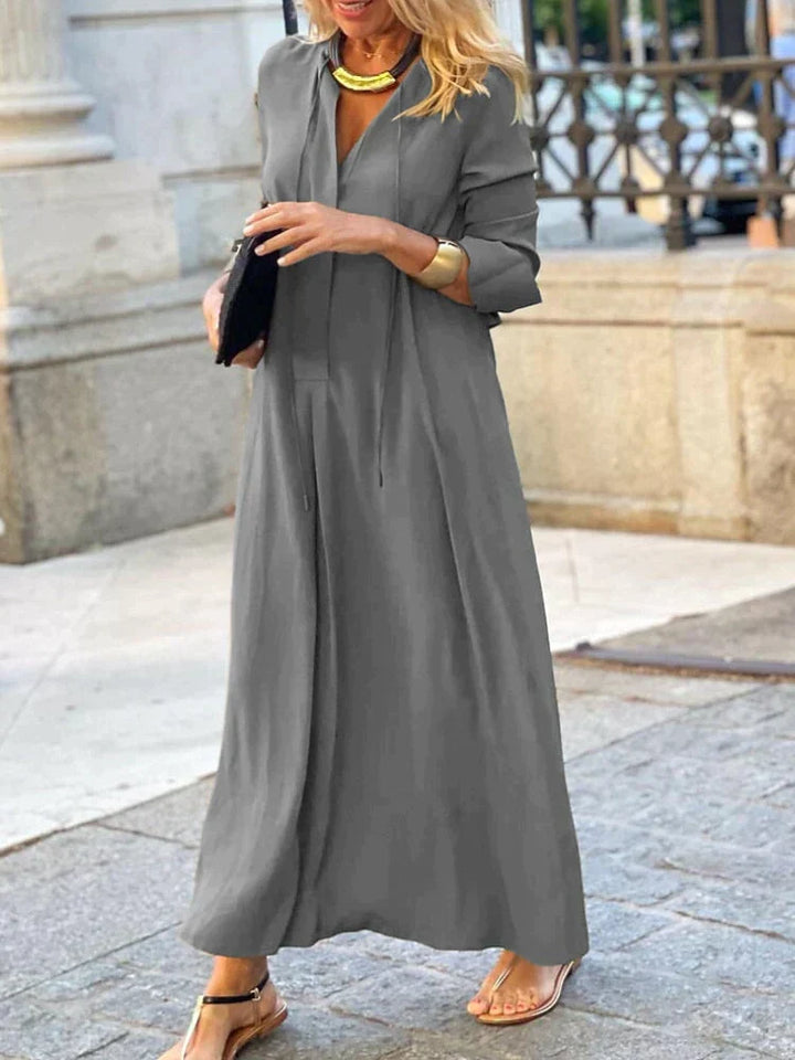 Vestito estivo donna con scollo a V, elegante e versatile, perfetto per un look comodo e alla moda in estate.