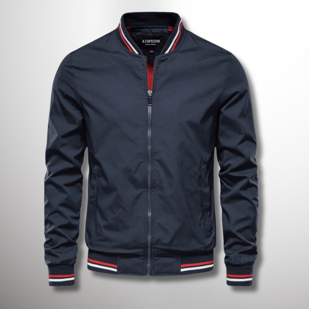 Giacca uomo impermeabile autunnale con zip, ideale per protezione da pioggia e vento. Stile versatile per l'outdoor.