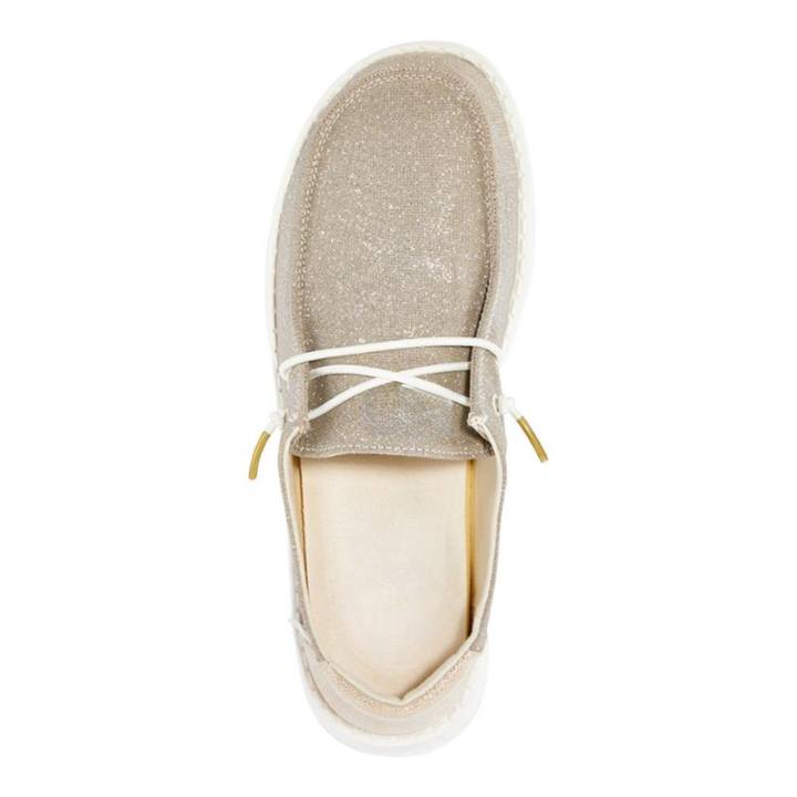Scarpe slip-on dorate scintillanti da donna, un tocco di lusso per calzature comode e alla moda.