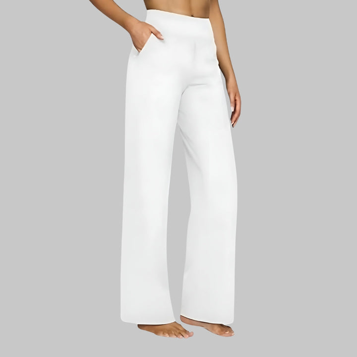 Pantaloni donna eleganti pull-on a vita alta, linea pulita e tasche per un comfort quotidiano senza sforzo.
