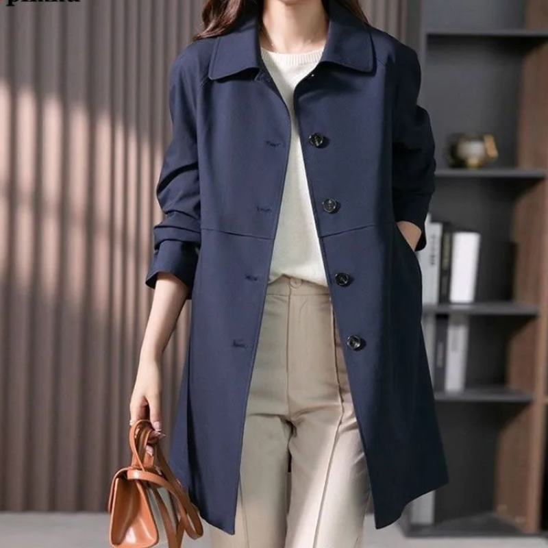 Comodo trench donna medio peso nero, ideale per moda femminile. Versatile per stile casual e ufficio in autunno.