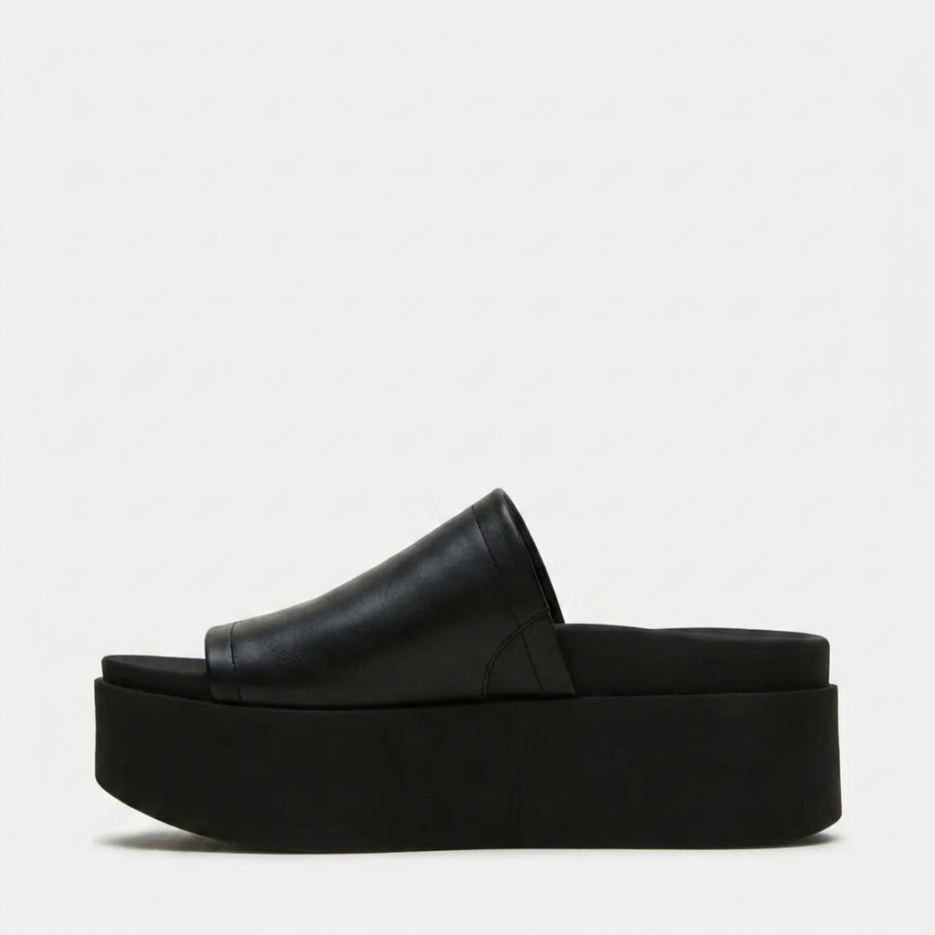 Sandali platform donna neri, casual ed eleganti, ideali per la moda estiva.