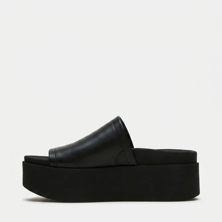 Sandali platform donna neri, casual ed eleganti, ideali per la moda estiva.
