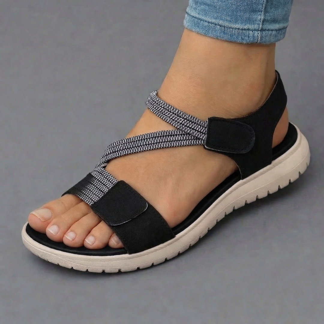 Primo piano sandali donna ortopedici con suola ammortizzata per supporto del piede e massimo comfort estivo.