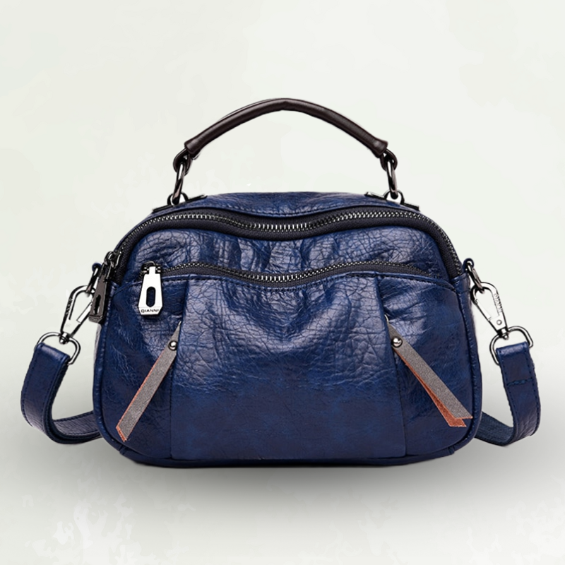 Questa borsa a mano da donna, multicolore e con tracolla removibile, è l'accessorio moda ideale.