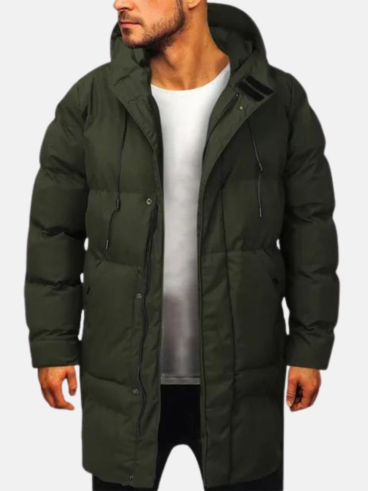 Giacca puffer uomo invernale, parka lungo e antivento, offre comfort e stile. Ideale per affrontare il freddo.