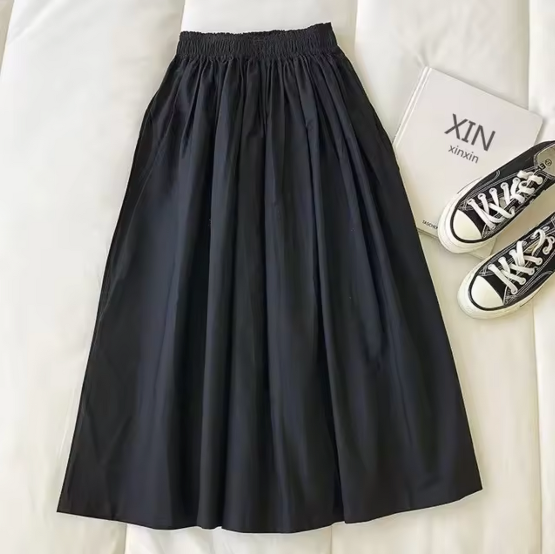 Gonna lunga estiva da donna, versatile per outfit chic o casual, con vita alta per comfort e stile.