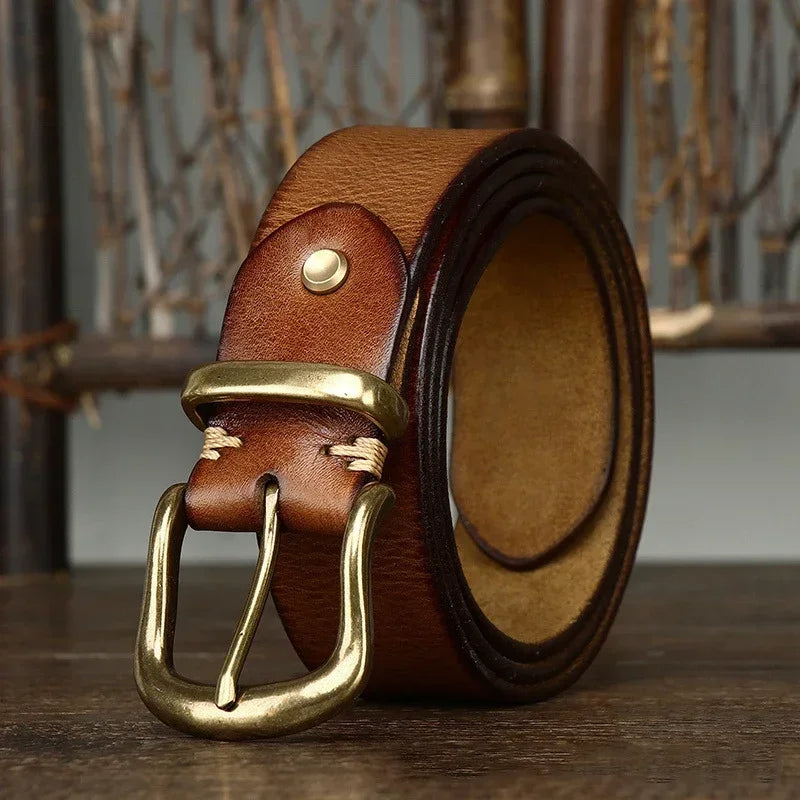 Cintura uomo in pelle pieno fiore, resistente e artigianale, con fibbia in ottone, accessorio di qualità.
