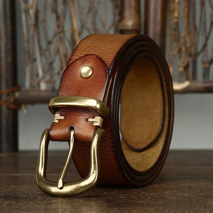 Cintura uomo in pelle pieno fiore, resistente e artigianale, con fibbia in ottone, accessorio di qualità.
