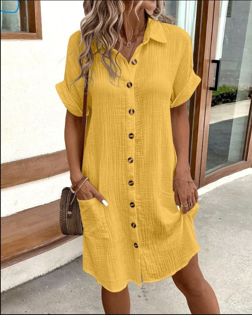 Vestito camicia da donna con bottoni, maniche lunghe, ideale per outfit casual chic e moda primavera.