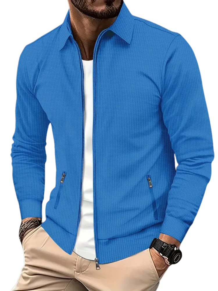 Uomo indossa giacca a coste leggera e versatile con zip, ideale per outfit primavera autunno. Moda maschile.