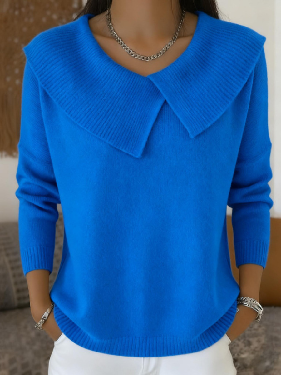 Pullover donna elegante con collo a coste e maniche lunghe. Vestibilità comoda, ideale per autunno/inverno.