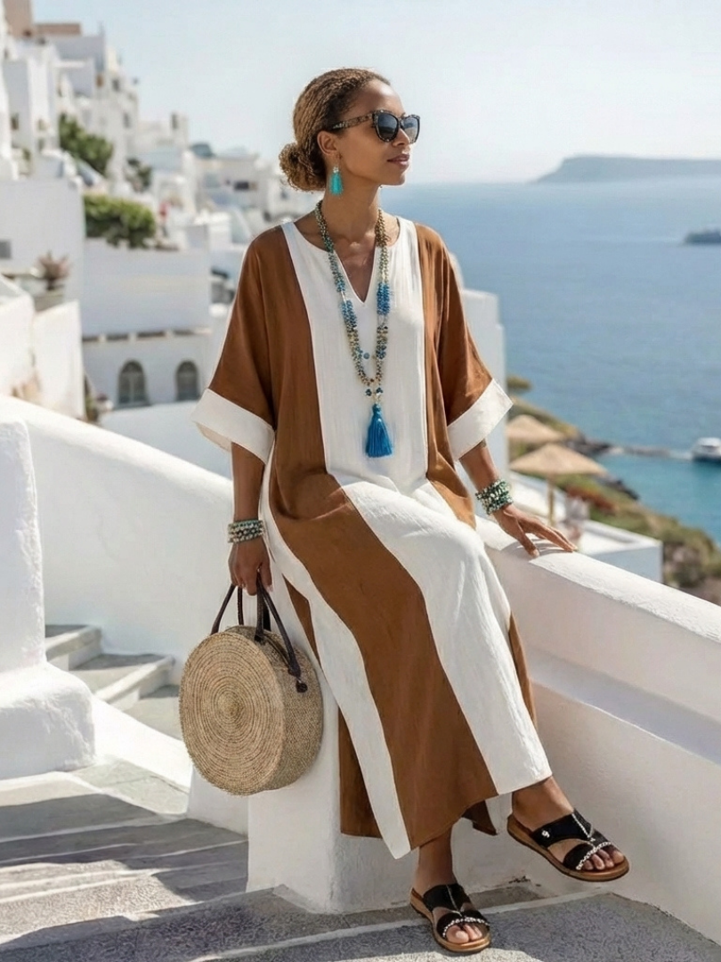 Abito fluido maxi color block da donna con maniche corte, ideale per un look casual estivo o per le vacanze.