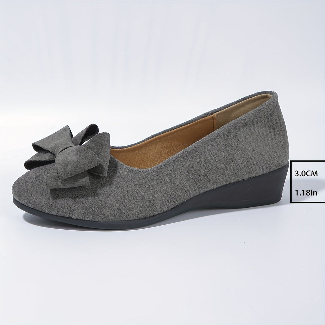 Scarpe donna ballerine con fiocco decorativo, garantiscono comfort e flessibilità.