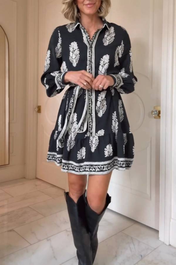 Vestito estivo donna chic con stampa floreale, maniche a lanterna e cintura. Mini abito a volant per primavera.