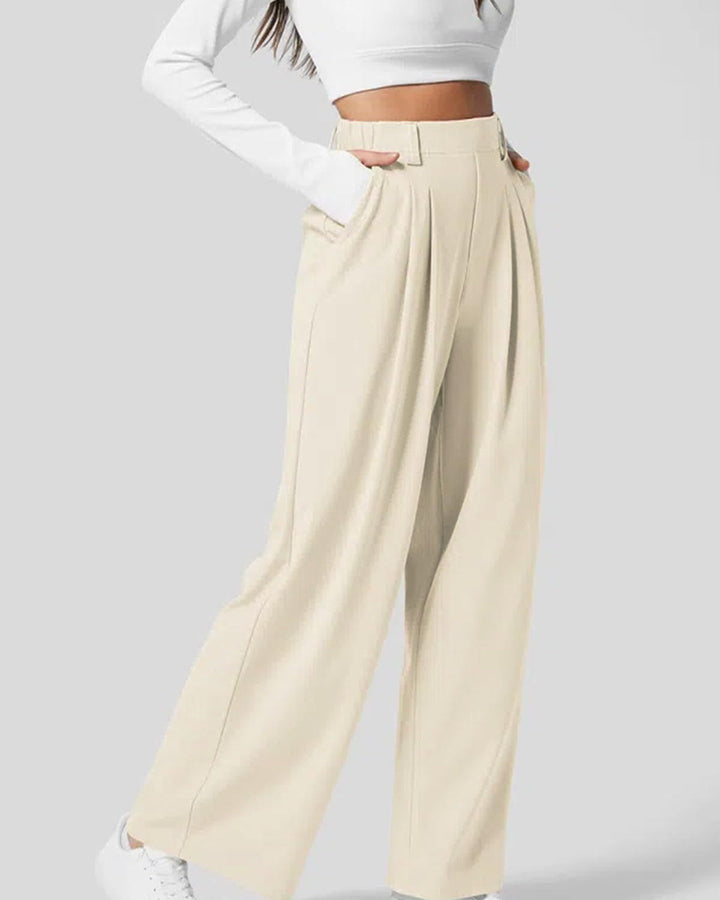 Pantaloni donna waffle con vita alta e gamba ampia. Stile casual chic, perfetti per comfort e tendenza.