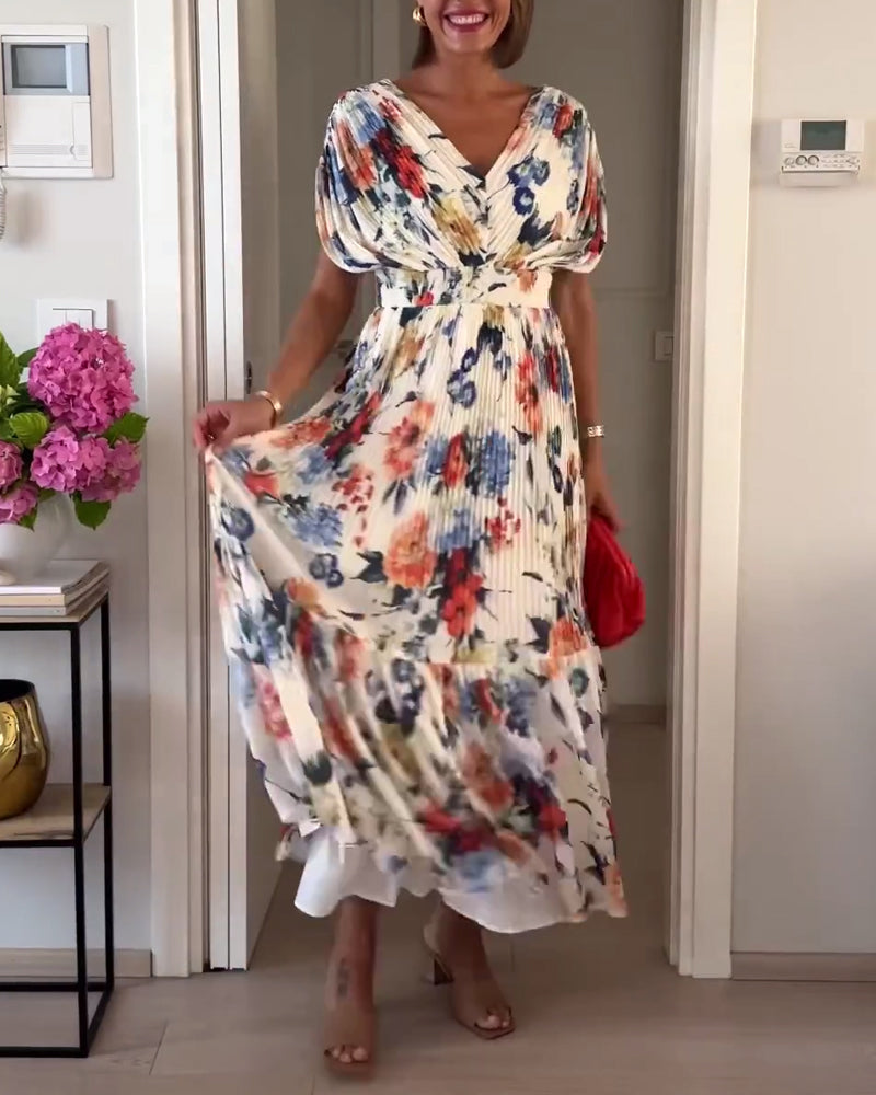 Abito floreale leggero ed elegante per donna. Perfetto come vestito estivo romantico, per un look casual chic raffinato.