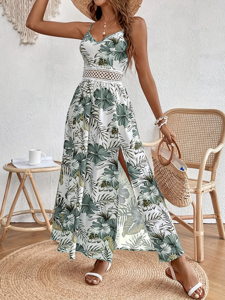 Vestito estivo floreale da donna, lungo e senza maniche, perfetto per serate eleganti o eventi all'aperto.