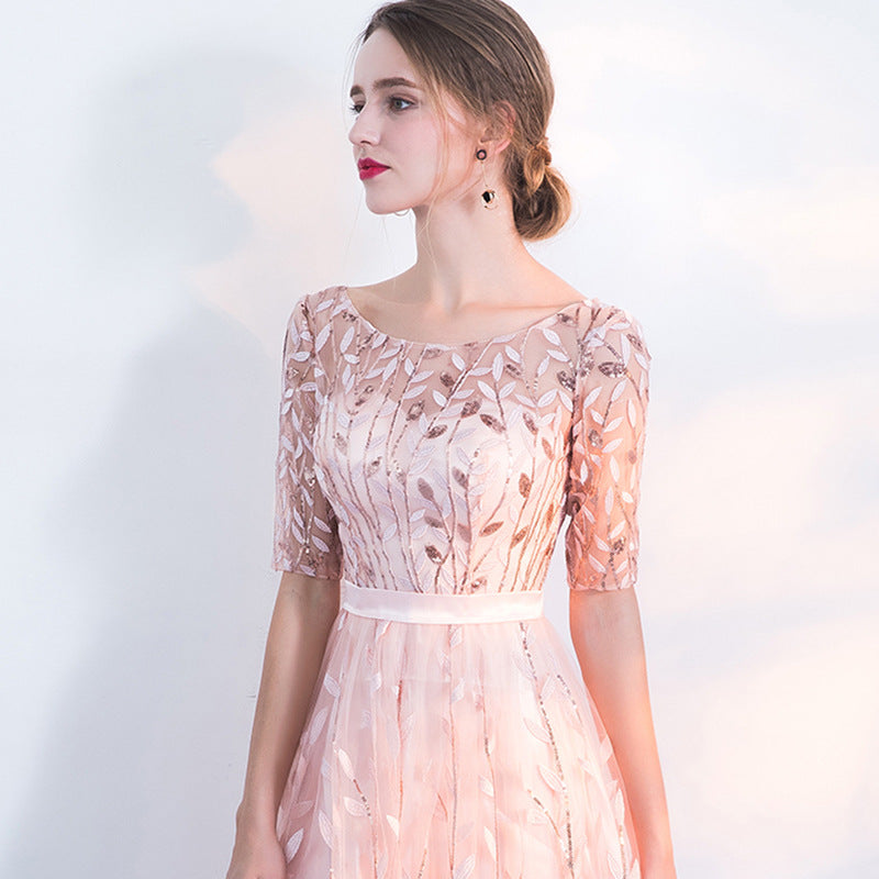 Abito donna rosa autunnale, girocollo, maniche corte. Ideale per un look elegante o casual, un capo versatile.