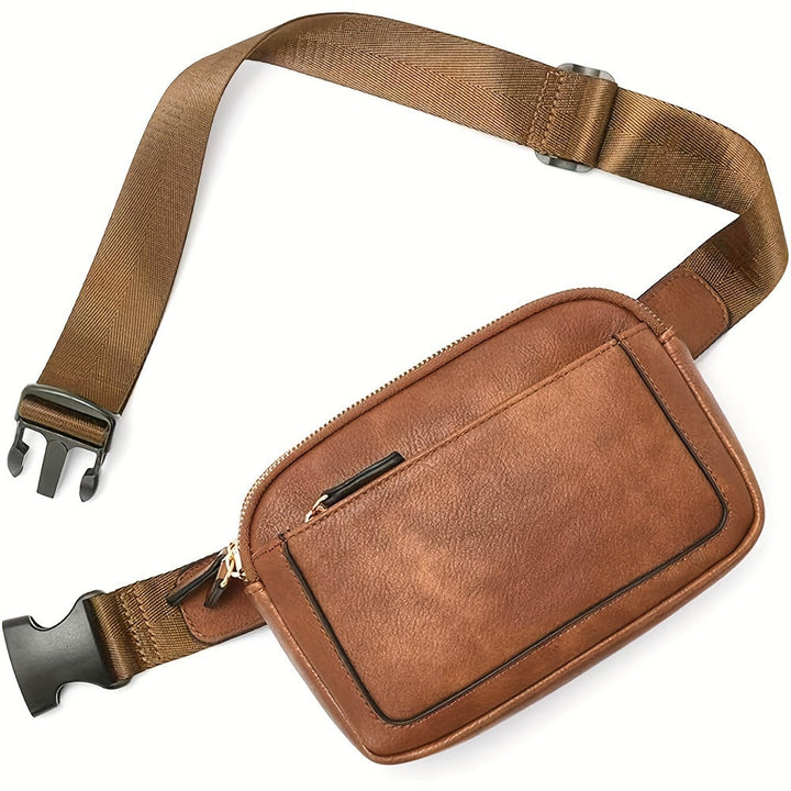 Persona indossa borsa a tracolla leggera unisex, ideale per viaggi, sport e uso quotidiano.