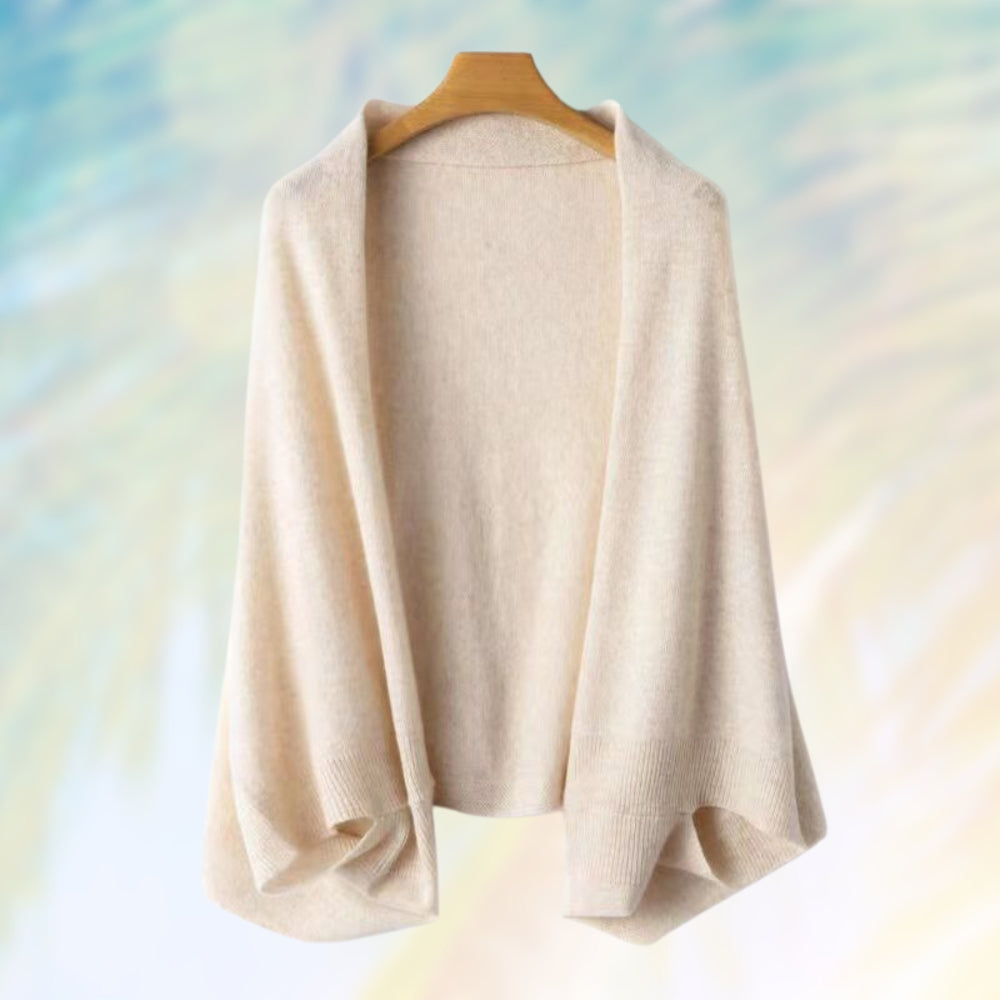 Dettaglio trama sciarpa donna in pura lana calda, accessorio moda invernale di qualità premium.