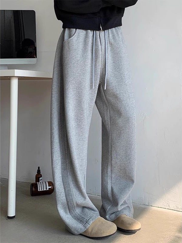 Pantaloni uomo gamba dritta vita media stile retrò tinta unita. Ideali per un look casual streetwear.