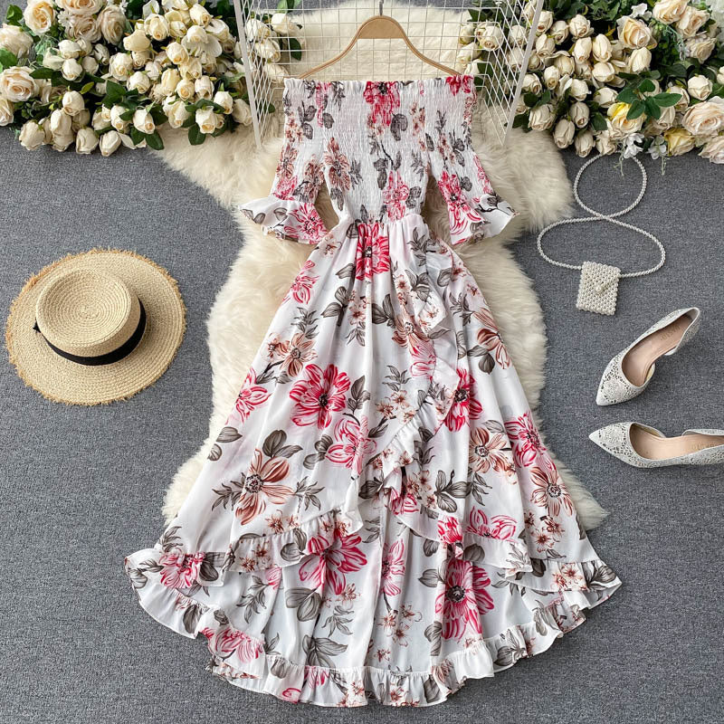 Abito elegante estivo midi con spalle scoperte e volant, perfetto per cene e eventi serali.