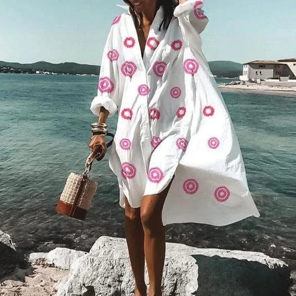 Abito chemisier midi estivo bianco da donna, elegante e fresco, per un look estivo chic e versatile.