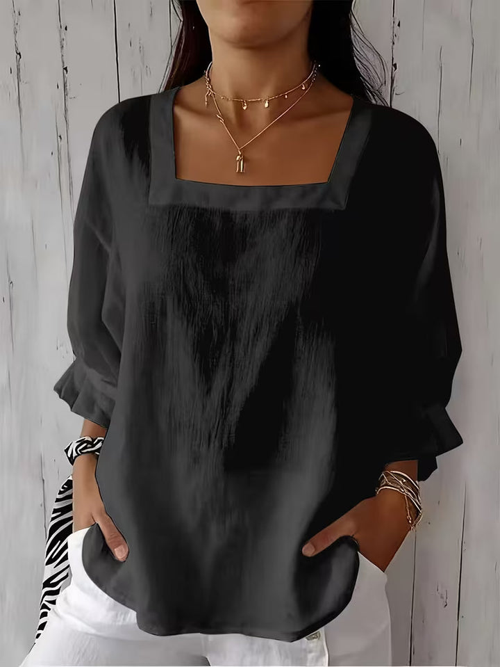Camicetta versatile donna, scollo quadrato, maniche fluide. Ideale per look primaverili ed estivi, elegante e comoda.