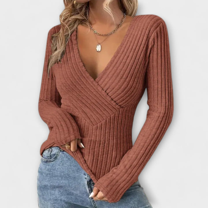 Maglione donna a maniche lunghe con scollo a V intrecciato. Perfetto per un look chic e comodo.