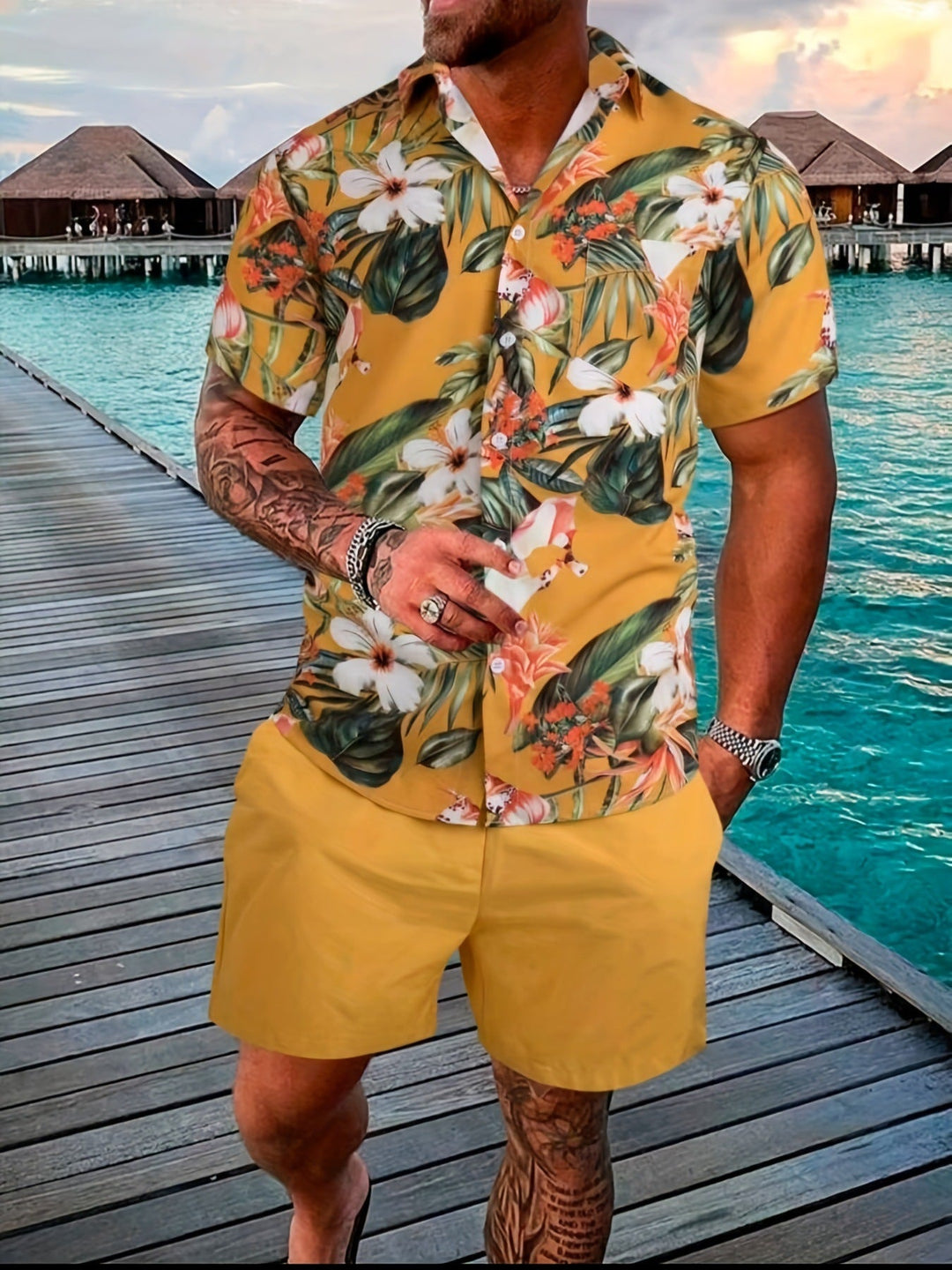 Abbigliamento uomo estivo: set camicia e shorts coordinati per un look casual e confortevole.