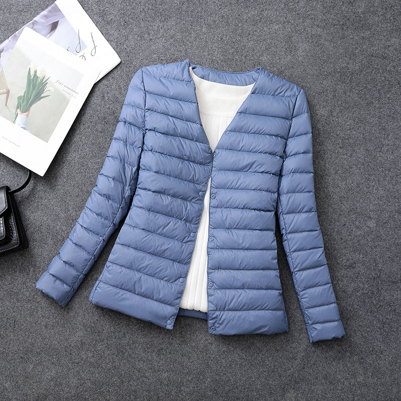 Piumino donna leggero e versatile, con scollo tondo, ideale per comfort casual.