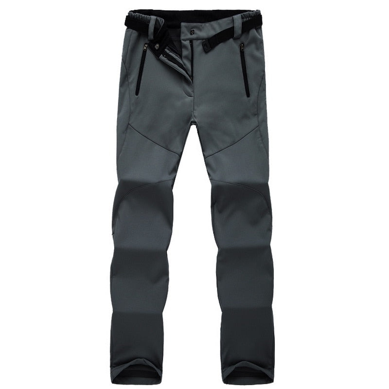 Pantaloni donna outdoor con tessuto impermeabile e antivento, protezione efficace per trekking e viaggi.