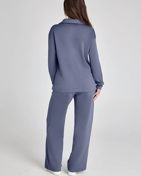 Set due pezzi autunno donna: felpa V-neck e pantaloni a gamba larga, ideali per comfort casa.