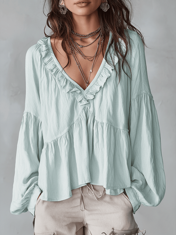 Top donna bohémien a maniche lunghe, ideale per un abbigliamento casual chic.