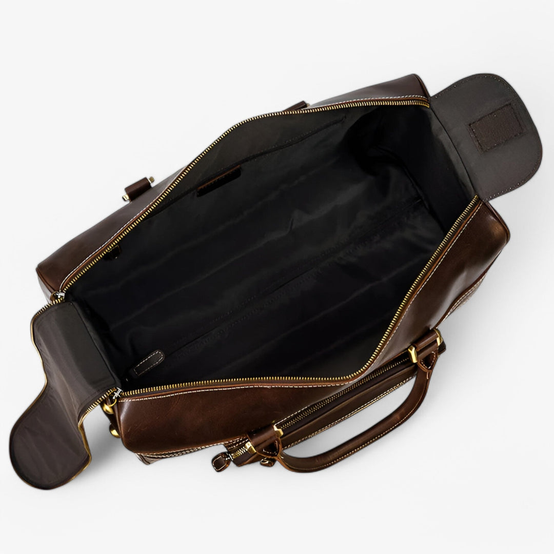 Dettaglio ruote e maniglia trolley da viaggio marrone 55 cm, unisex, perfetto come bagaglio a mano cabina.