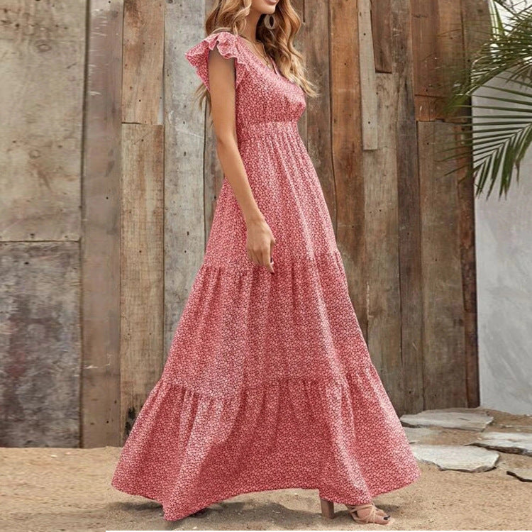 Maxi vestito estivo da donna con maniche corte, scollo a V profondo e romantica stampa floreale boho.