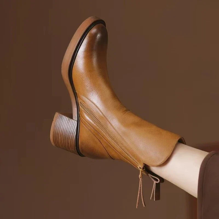 Stivaletti donna in pelle con tacco, dal design raffinato e comfort imbattibile.