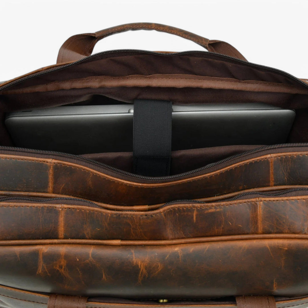 Portadocumenti marrone per laptop, con tracolla regolabile, per viaggio e lavoro.