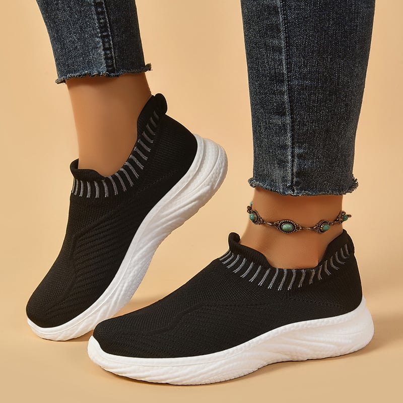 Scarpe casual slip-on da donna, design leggero e traspirante per passeggiate confortevoli.