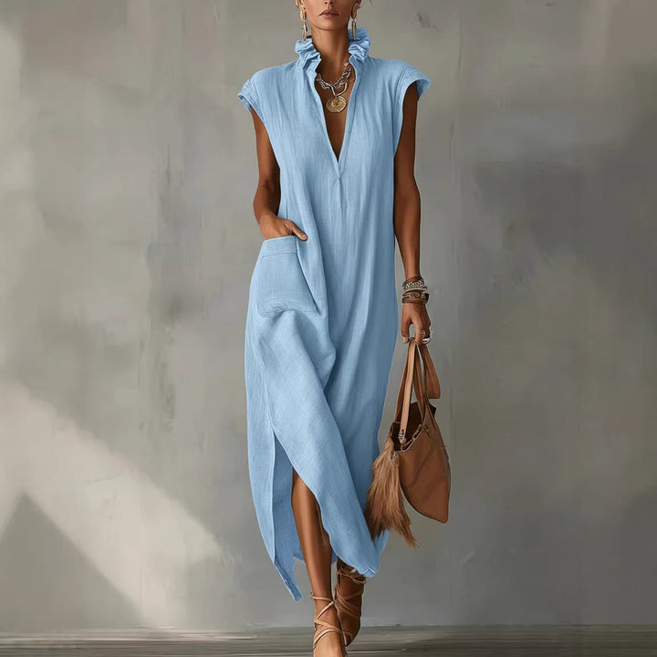 Vestito midi donna senza maniche tinta unita, design ampio e confortevole. Ideale per outfit quotidiani e moda estiva.