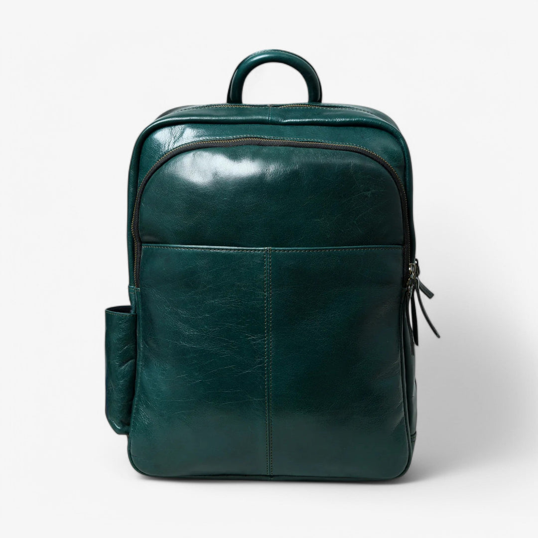 Zaino donna verde minimalista elegante. Perfetto per outfit quotidiani e viaggi.