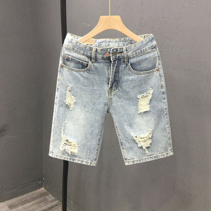 Pantaloncini uomo strappati blu cielo, vita media, look casual estivo e alla moda.