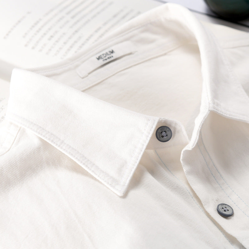 Camicia uomo a maniche lunghe con design cuciture, perfetta per uno stile casual di moda autunnale.