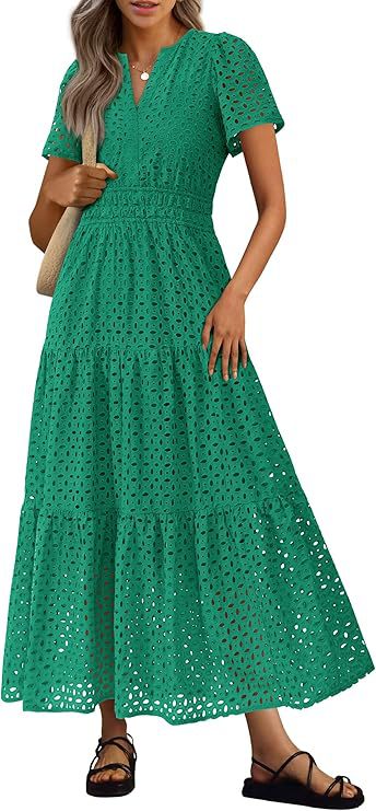 Maxi abito spiaggia donna, fluido e fresco, con scollo a V e maniche corte. Moda estiva essenziale.
