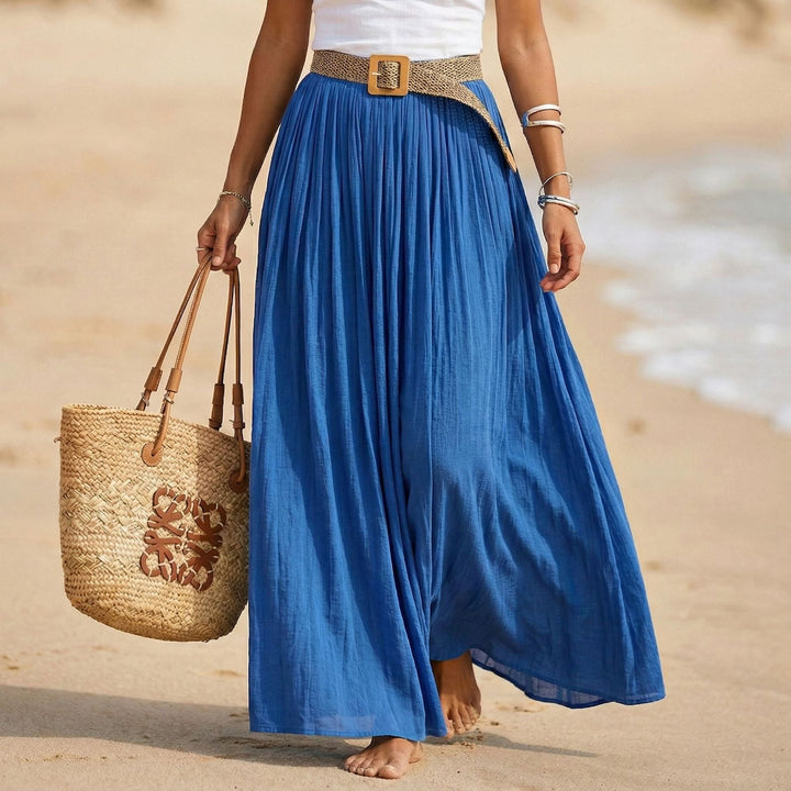 Abito maxi donna svasato, vita morbida per eleganza estiva e comfort. Perfetto vestito da mare.