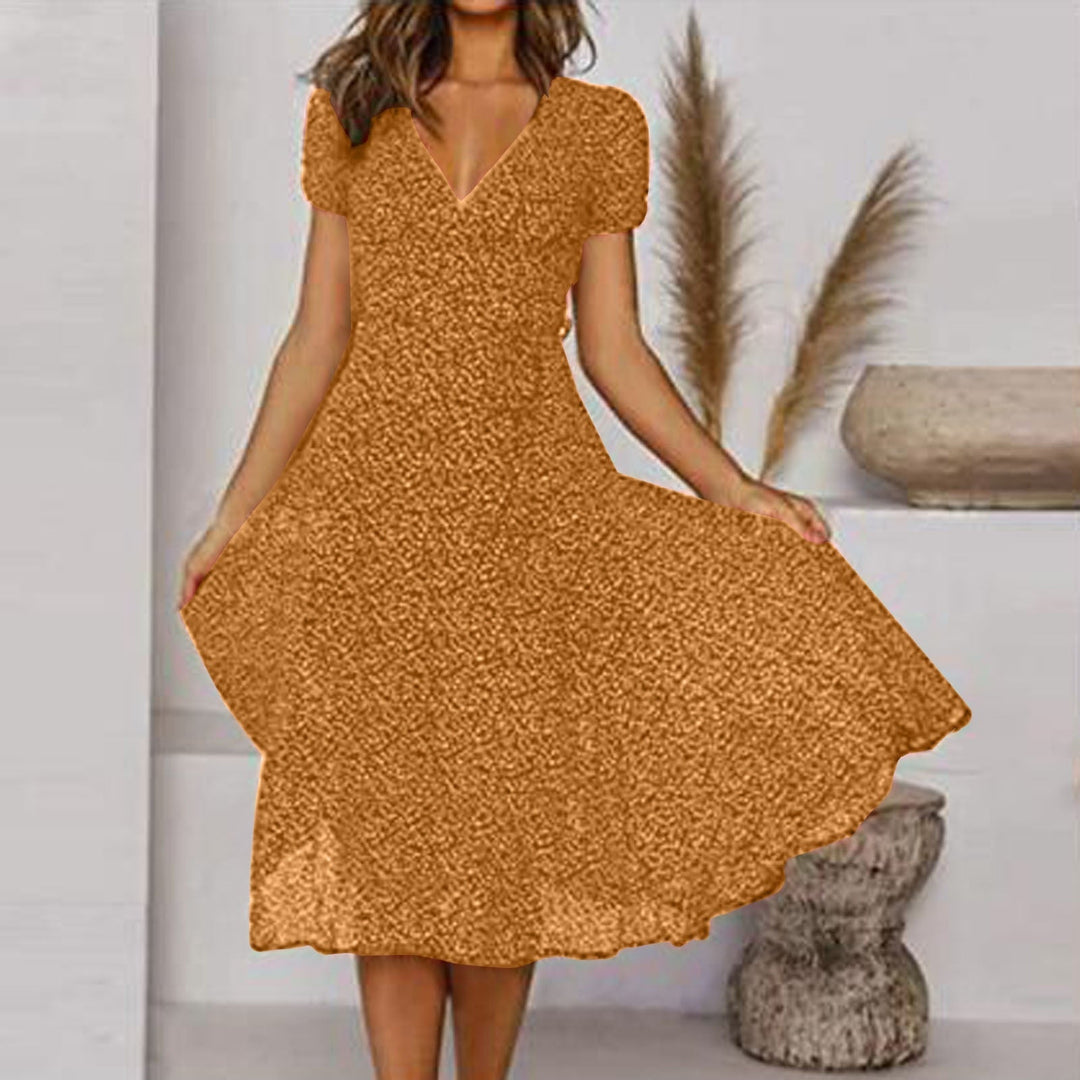 Abito donna midi linea A scollo V, gonna fluida. Perfetto per la moda primavera estate, stile elegante e casual.