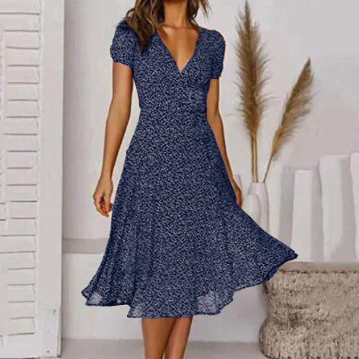 Versatile abito donna linea A con scollo V, gonna fluida. Ideale per primavera/estate, comfort casual ed eleganza.
